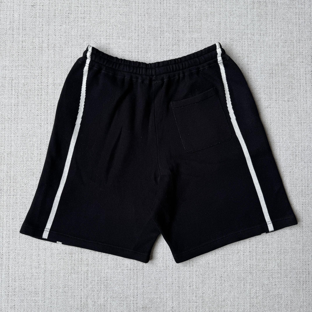 This is the Supreme × Umbro collaborative SS25 knit soccer shorts