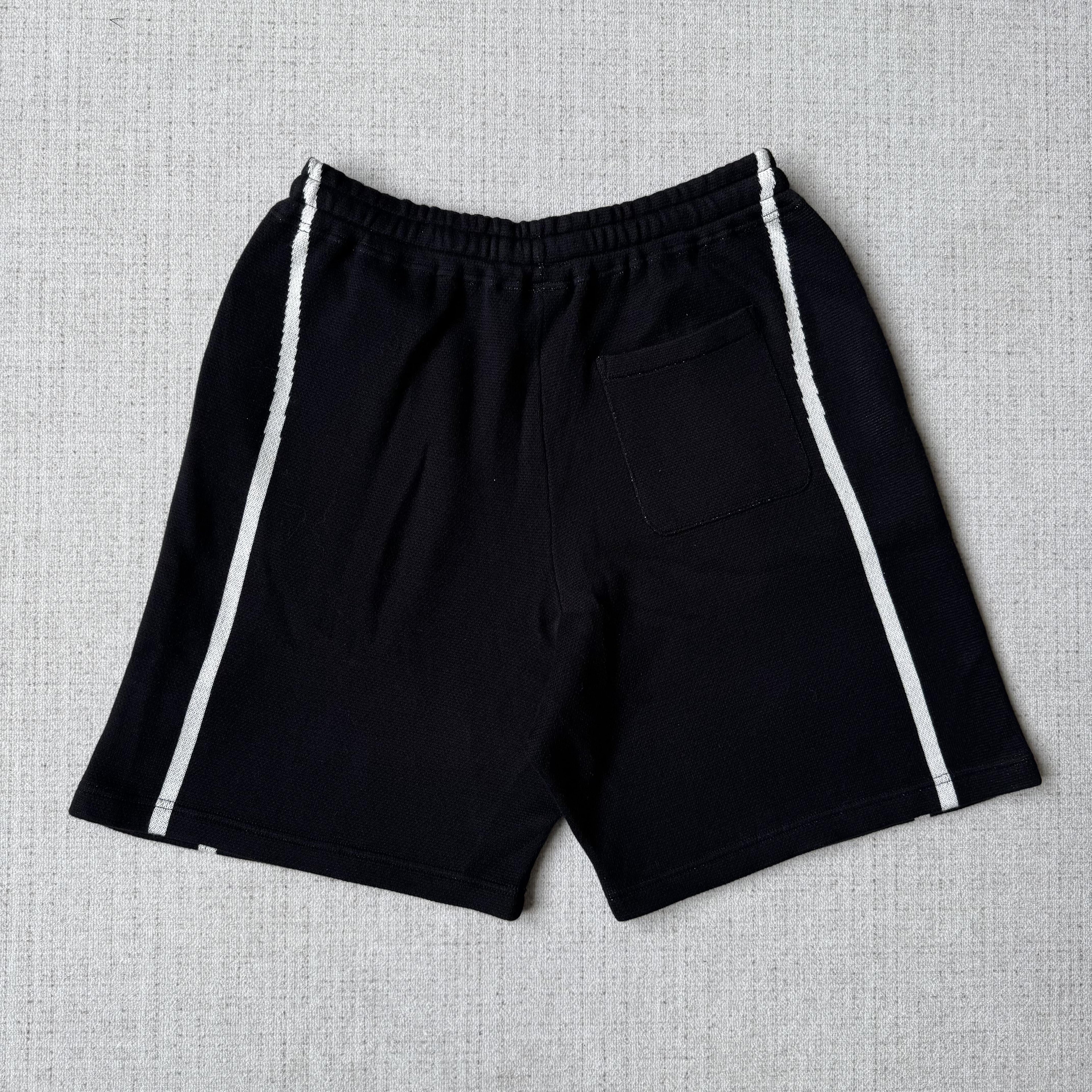 This is the Supreme × Umbro collaborative SS25 knit soccer shorts