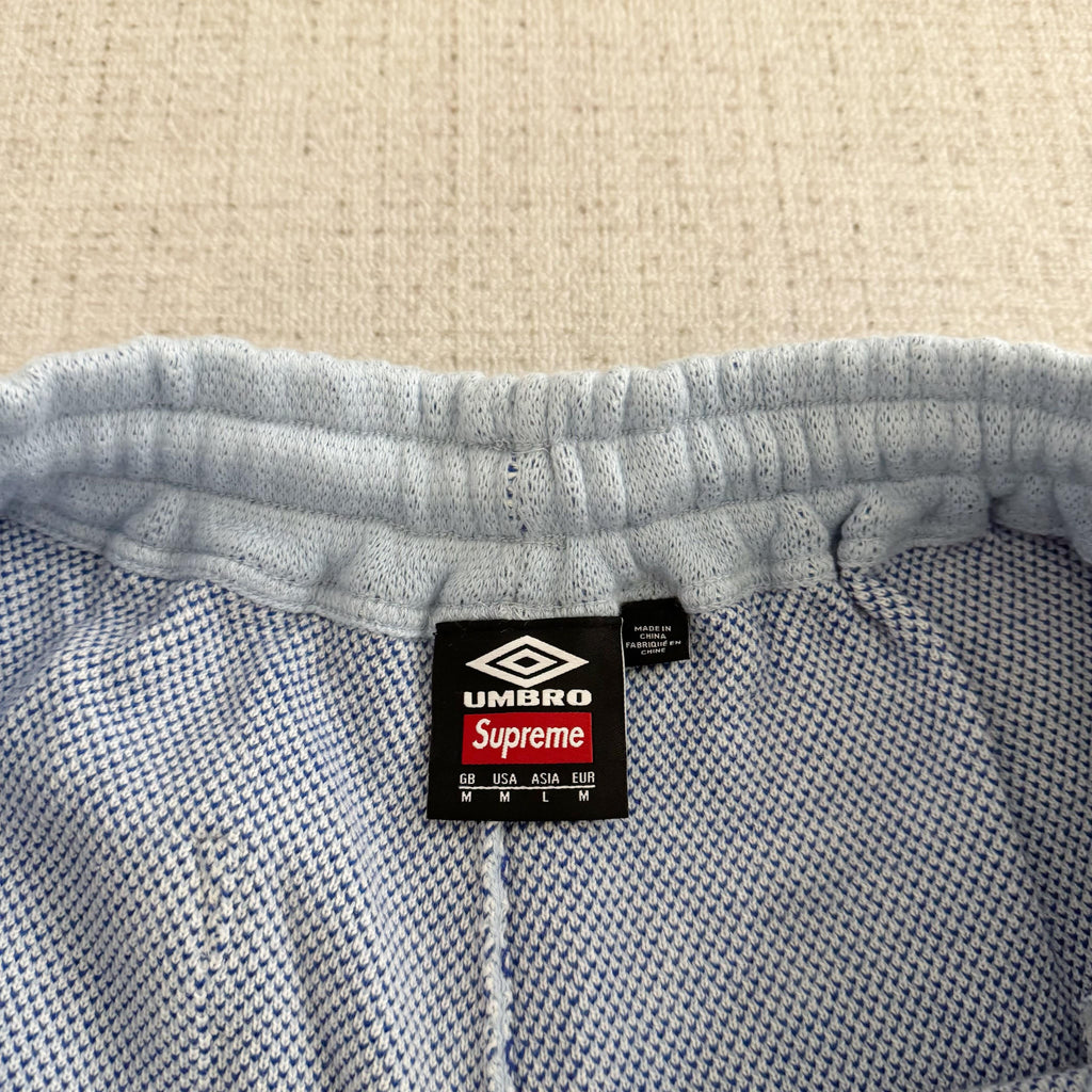 This is the Supreme × Umbro collaborative SS25 knit soccer shorts