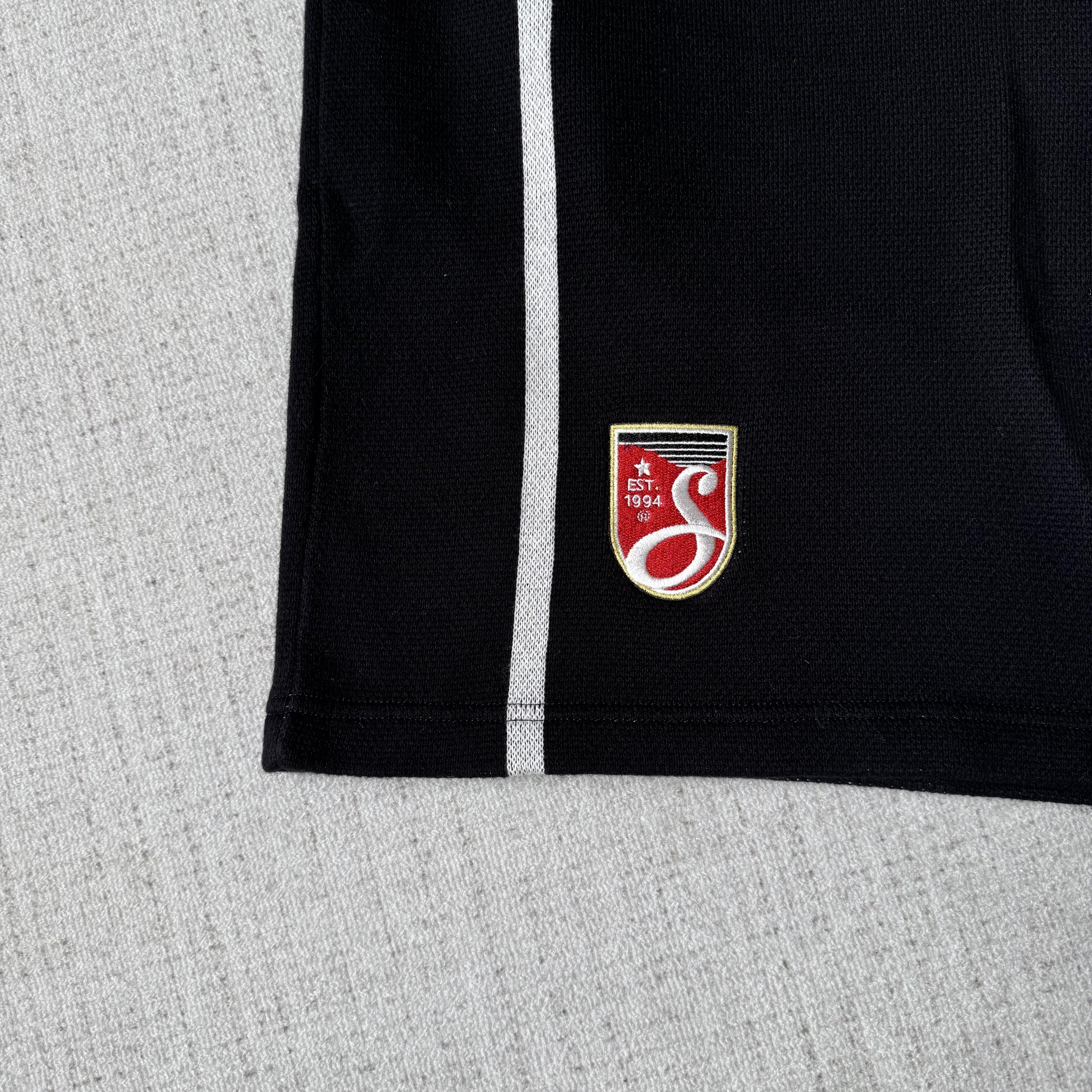 This is the Supreme × Umbro collaborative SS25 knit soccer shorts