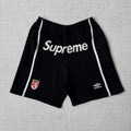This is the Supreme × Umbro collaborative SS25 knit soccer shorts